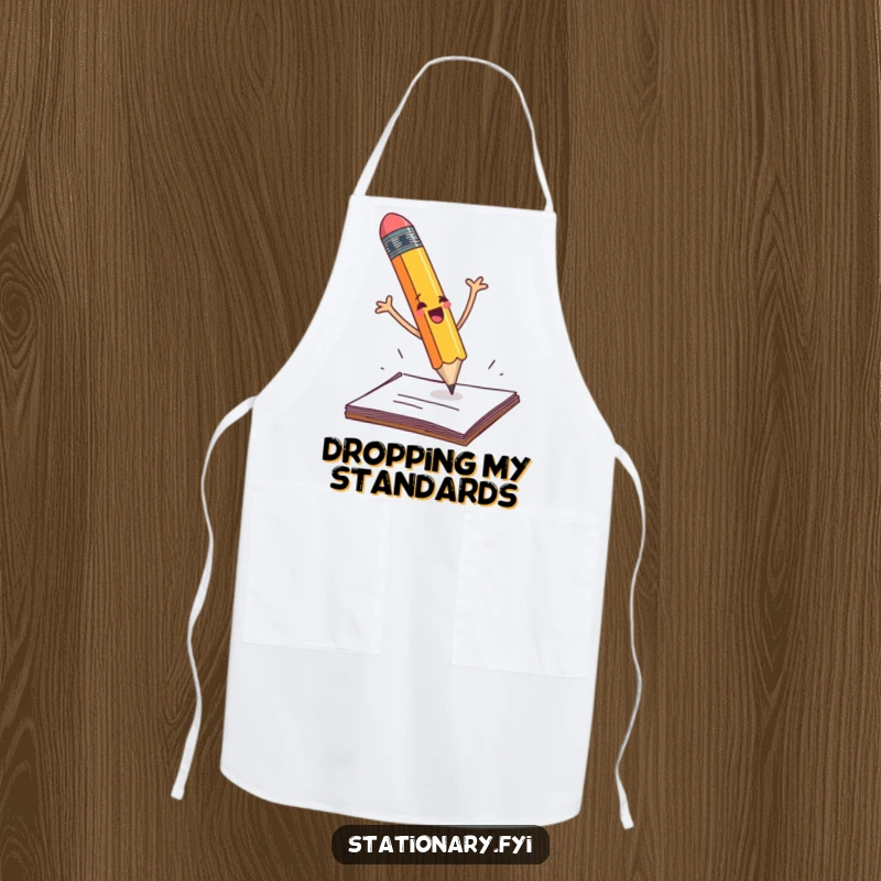 Funny pencil dramatically falling off a desk with flailing arms, a humorous apron for kitchen enthusiasts.