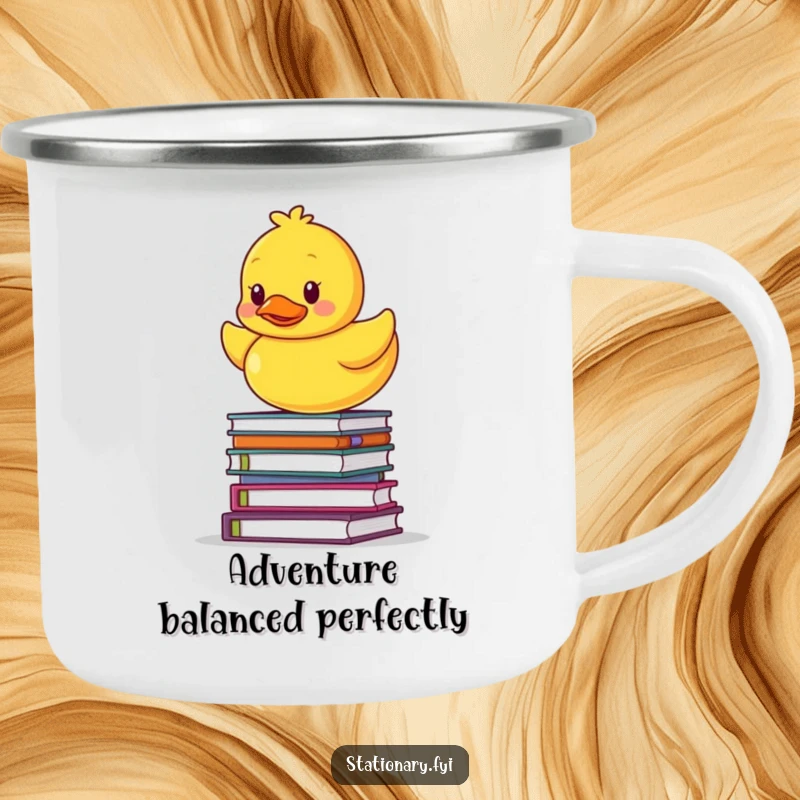 Funny enamel camping mug showing a rubber ducky balancing on a stack of notebooks, perfect for outdoor humor.