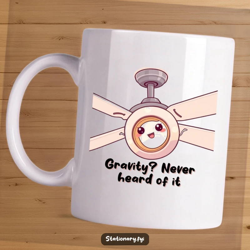 Funny tape roll comically sticking to a spinning ceiling fan, showcasing office absurdity for a humorous gift.