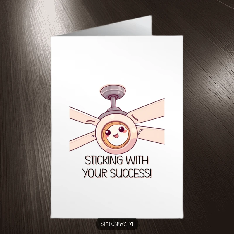 Funny Free Printable Congratulations Card: A roll of tape comically stuck to a ceiling fan, celebrating success.